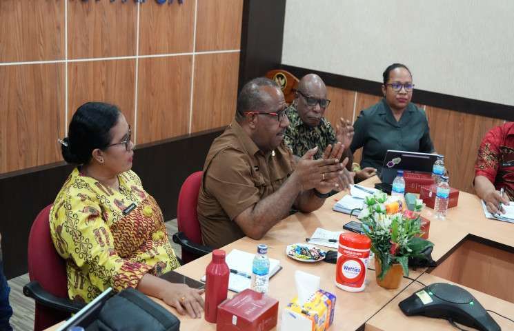 Teks Foto : Desk PSU Papua saat menggelar rapat. (ist)